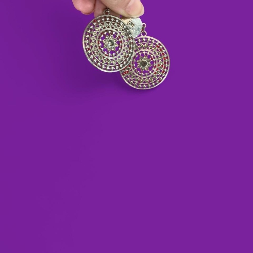 Silver tone round concho style earrings with shimmering  rhinestones